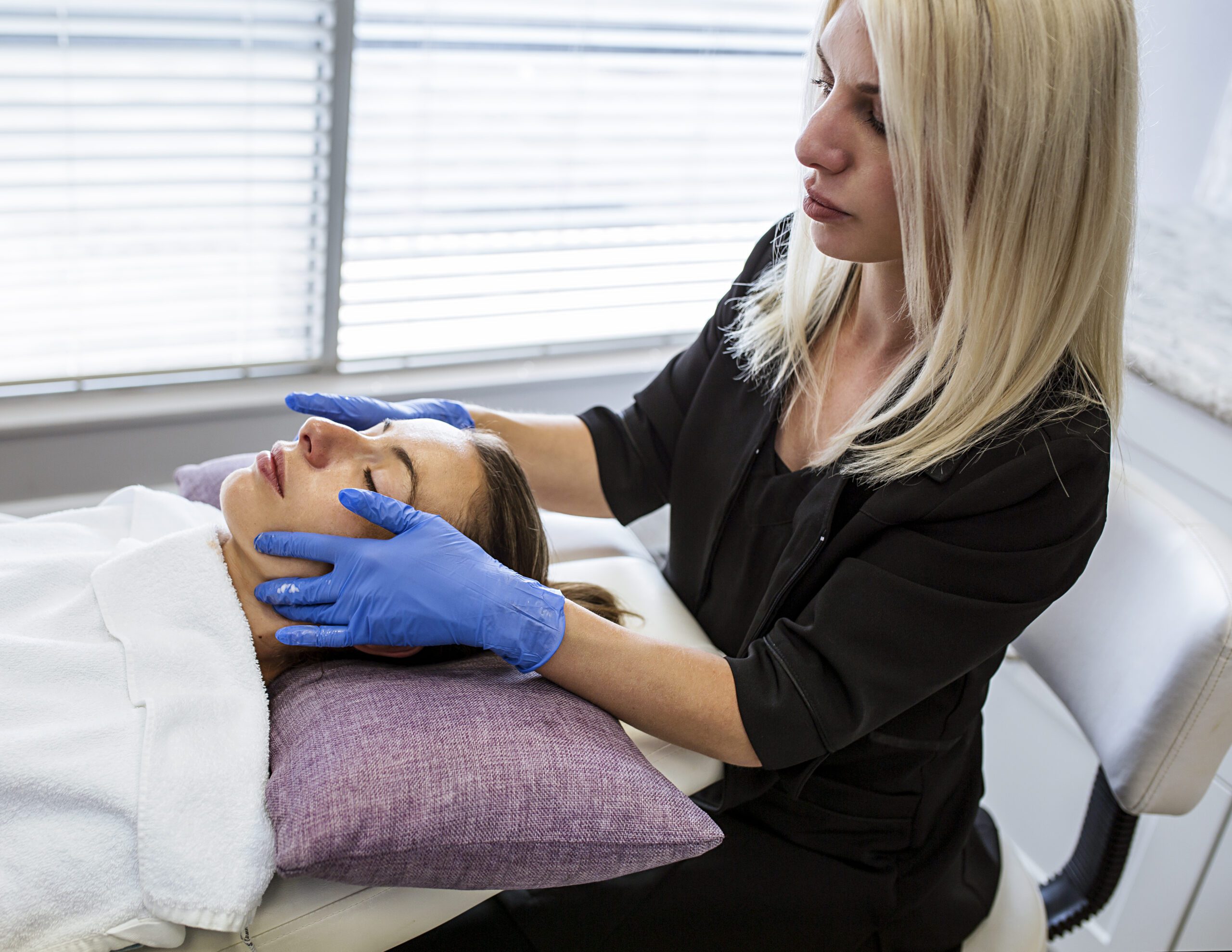 woman receiving facial | Revive Laser